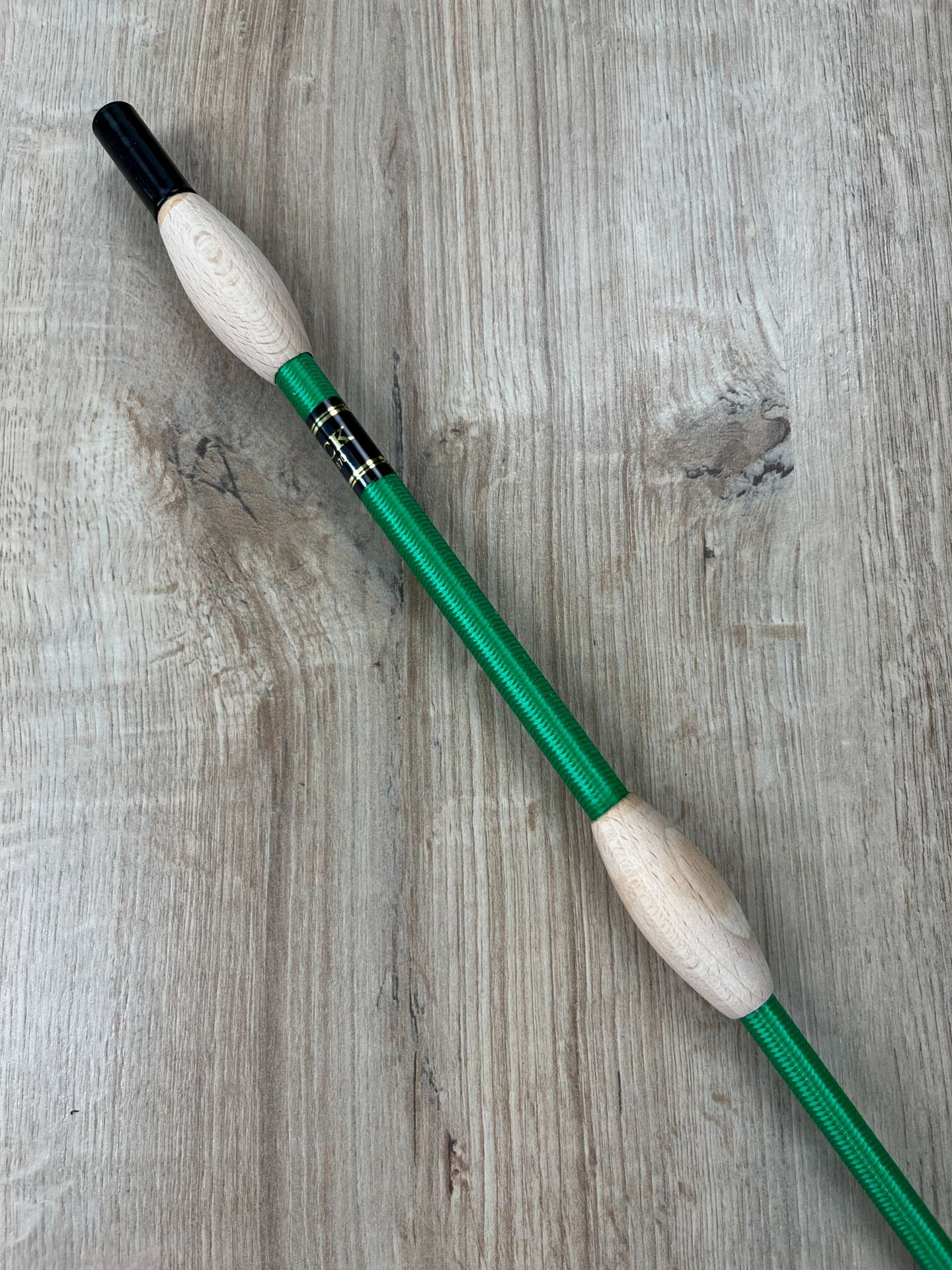 Fleck Balance Gerte grün mit Naturholz-Knubbeln