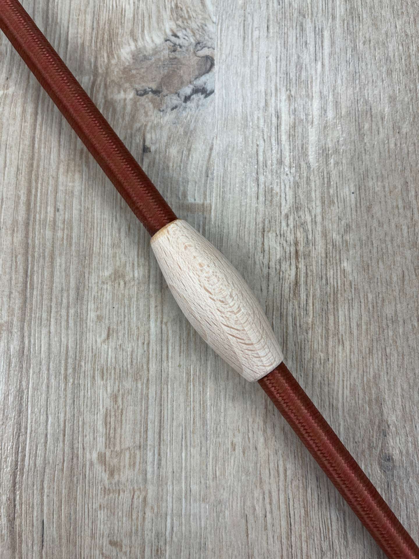 Fleck Balance Gerte caramel mit Naturholz-Knubbeln