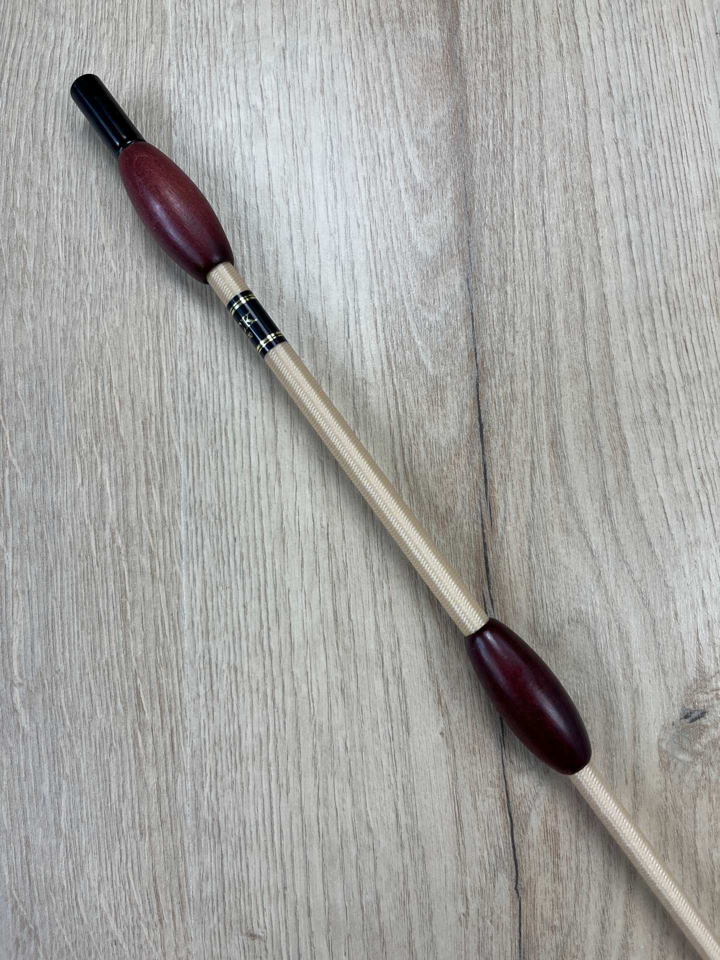 Fleck Balance Gerte beige mit Mahagoniholz-Knubbeln