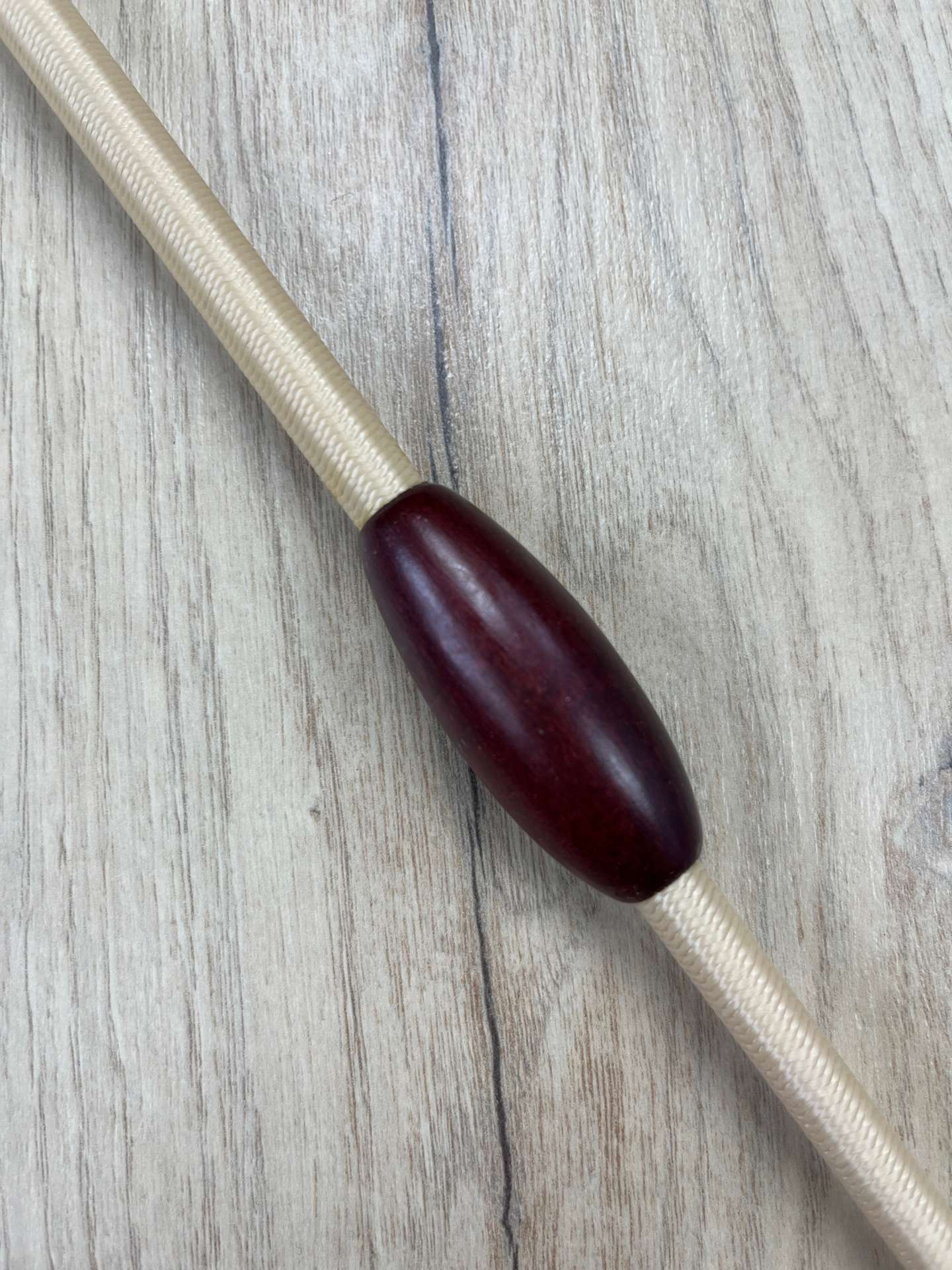 Fleck Balance Gerte beige mit Mahagoniholz-Knubbeln