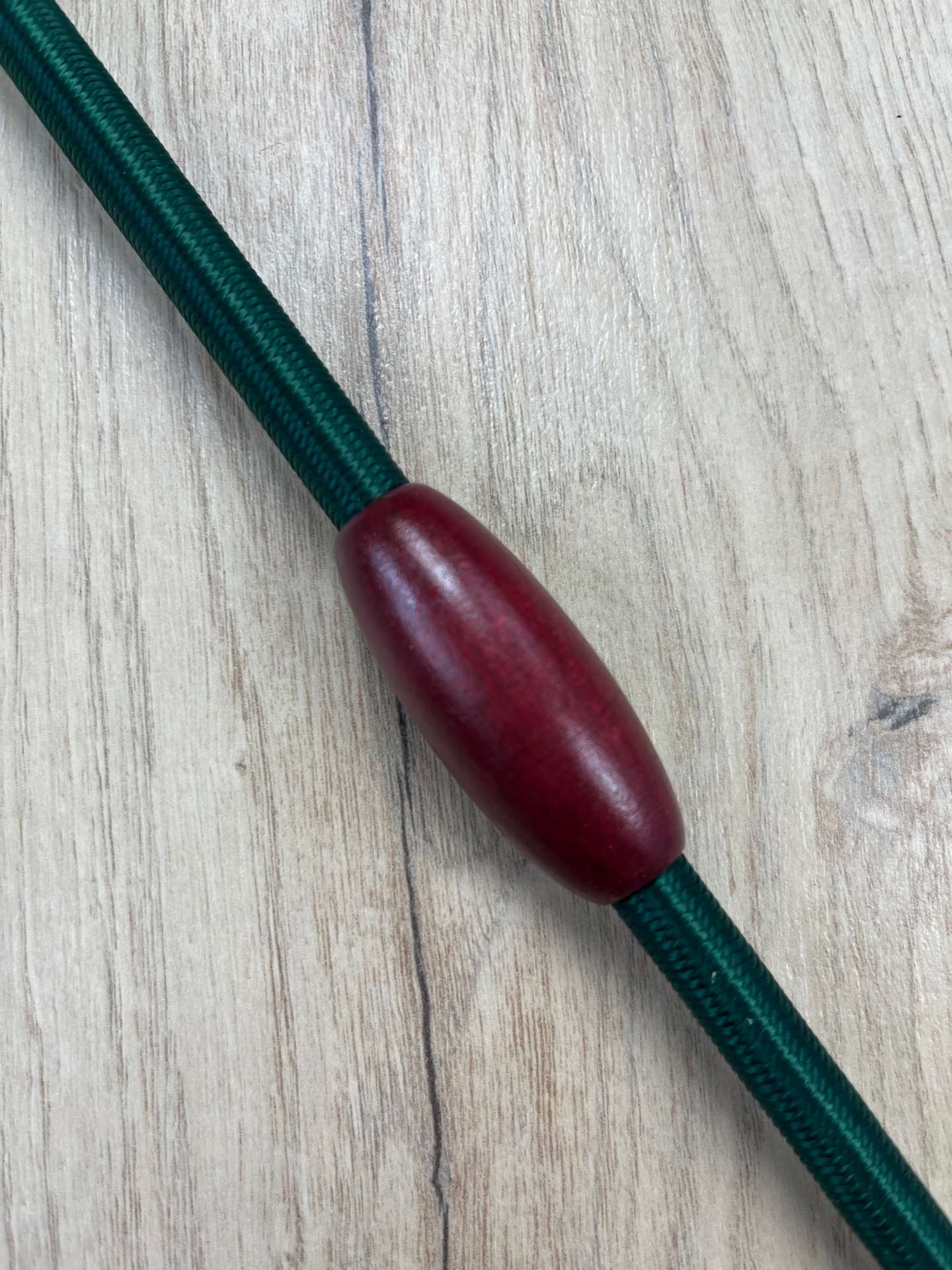 Fleck Balance Gerte tannengrün mit Mahagoniholz-Knubbeln