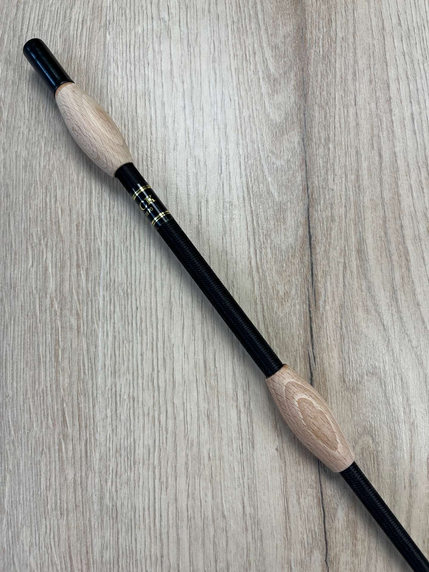 Fleck Balance Gerte schwarz mit Naturholz-Knubbeln